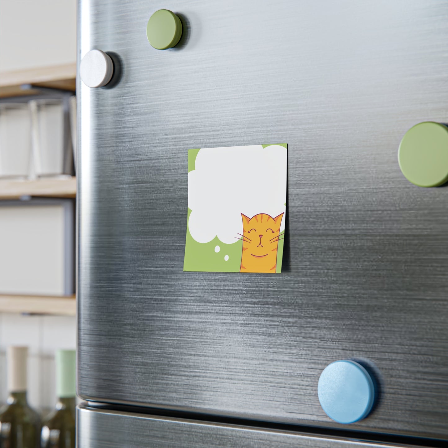 Fridge with a colorful sticky of a cat