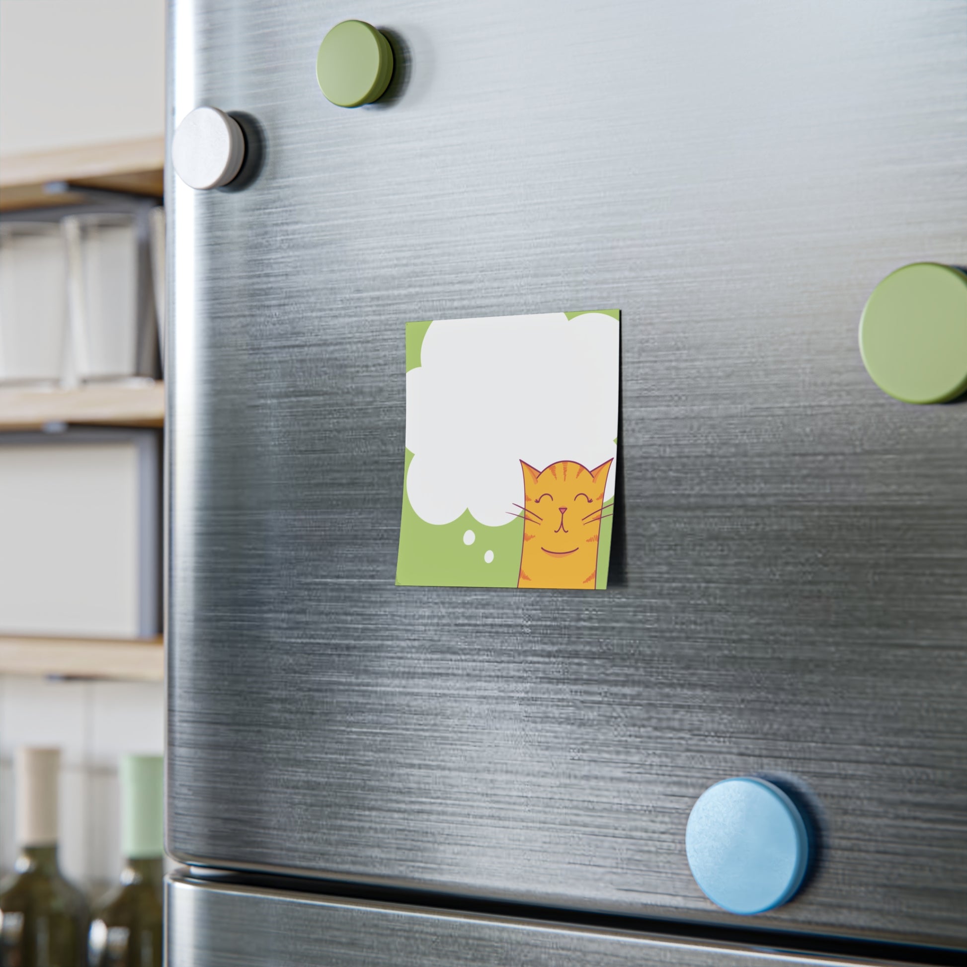 Fridge with a colorful sticky of a cat